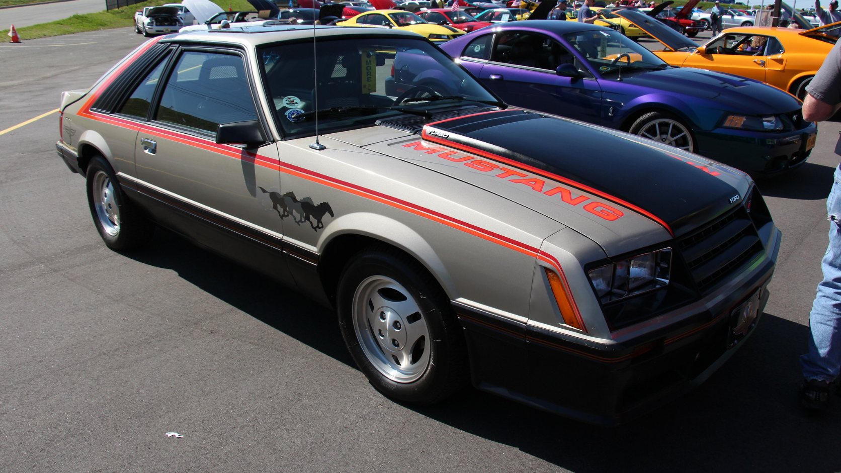 Pewter 1979 Ford Mustang Indy 500 Pace Car replica hatchback with black and orange graphics